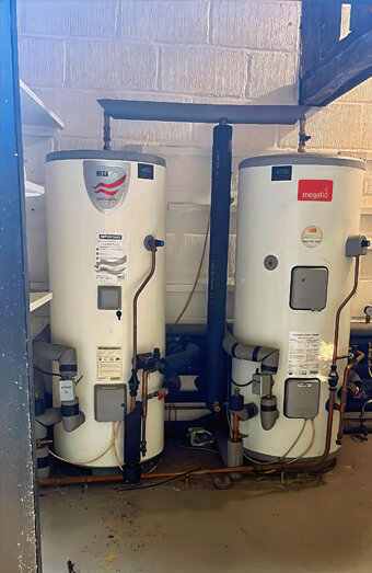 https://highgatehotwater.com.au/uploads/2025/06/electric-hot-water-system-10198.jpg